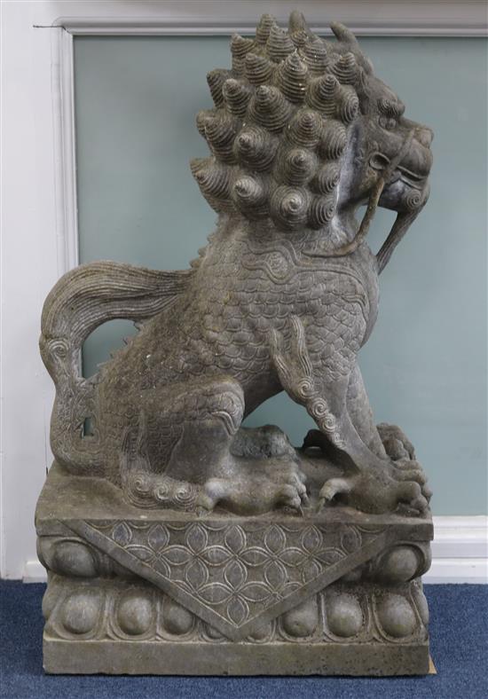 A pair of modern dark reconstituted stone Chinese seated kylin, approx. H.102cm